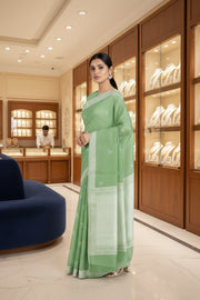 Green Jacquard Saree with Silver Zari Border and Blue and Golden Zari Butis