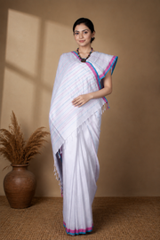 White Saree with Blue and Magenta Linings and Border