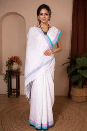 White Saree with Pink and Blue Linings and Border