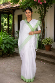 White Saree with Green Linings and Border