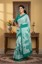 White and Green Batik Print Saree with Golden Zari Border