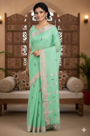 Green Saree with Golden Zari Border and Magenta Butis
