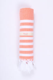 Soft and Luxurious Peach Honeycomb Waffle Towel with White Stripes