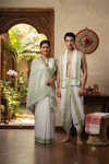 Traditional Handloom Couple Set in White with Self Striped and Green Dobby Border
