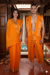 Traditional Handloom Joda Set in Orange with Goldan Zari Dobby Border