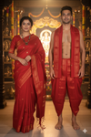 Red Dobby Couple Set with Golden Zari Border and Green Butis