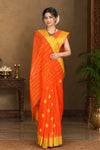 Orange Dobby Saree with Blue, Golden Zari and Yellow Border and Butis