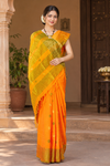 Orange Dobby Saree with Green and Golden Zari Border and Butis