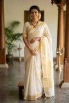 Ivory White Jacquard Cotton Banarasi Saree with Golden Zari Border and Butis