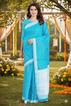 Blue Jacquard Saree with Silver Zari Border and Green, White and Yellow Butis
