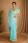 Cyan Saree with White, Green, Yellow and Pink Border