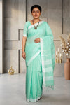 Green Saree with White Linings and Border