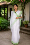 White Saree with Green Linings and Border