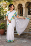White Saree with Green, Yellow and Blue Linings and Border