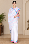 White Saree with Red, Pink and Blue Linings and Border