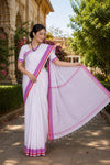 White Saree with Red and Purple Linings and Border