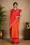 Orange Saree with White and Red Border