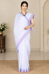 White Saree with Pink and Blue Linings and Border