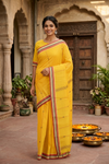 Sunrise Yellow Saree with Butis and Red, Black, Yellow, and Cream Border