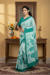 White and Green Batik Print Saree with Golden Zari Border