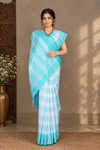 White Saree with Golden Zari and Cyan Lining Checks and Border