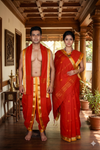 Red Couple Set with Golden Zari and Orange Border and Butis